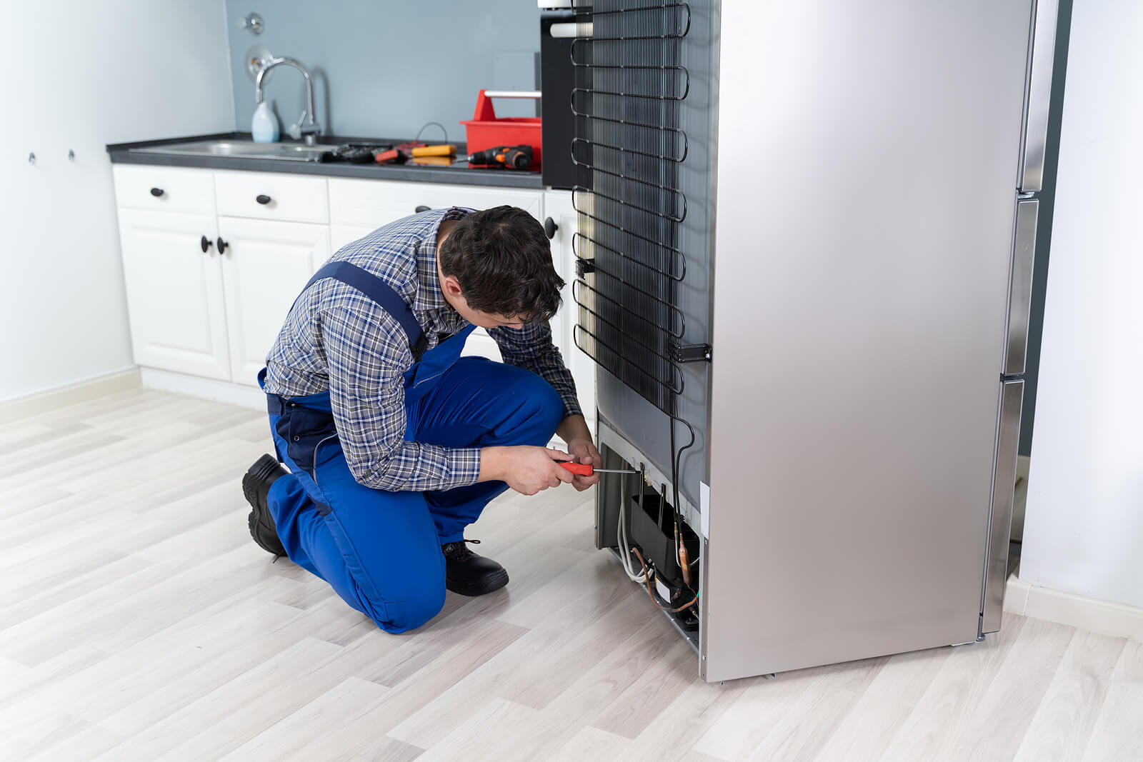 KL Fridge Repair technician at work